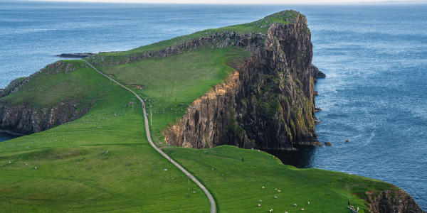 isle of man cliffs with a singular road leading to the edge of the cliff